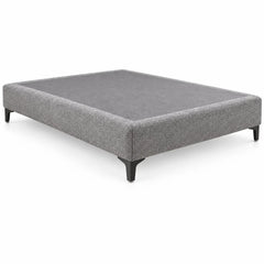 בסיס מיטה מרופד SOFT BASE בלי מזרן על רקע לבן, בד אריג אפור ורגלי זווית שחורות